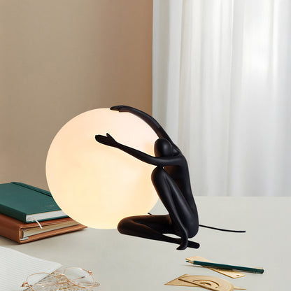 Humanoid Ball Holding Modern Material Table Lamp