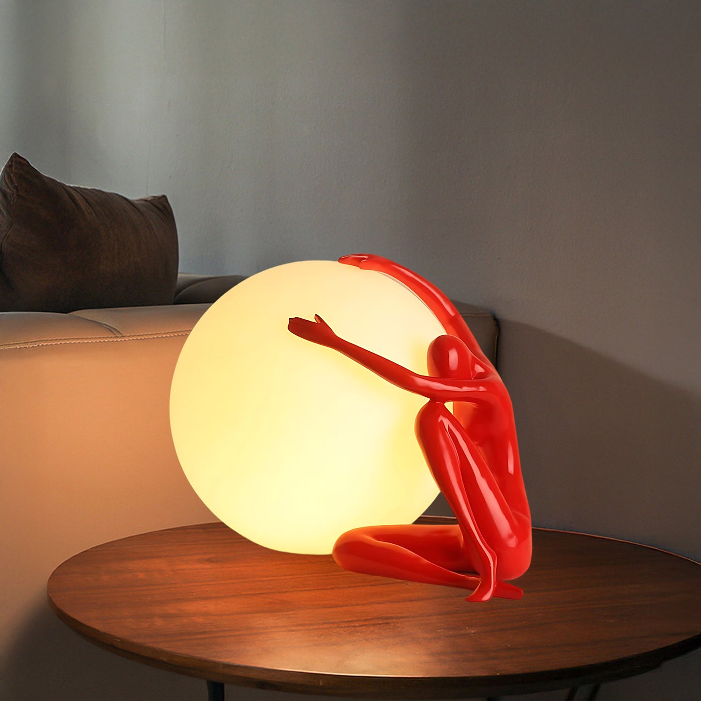 Humanoid Ball Holding Modern Material Table Lamp