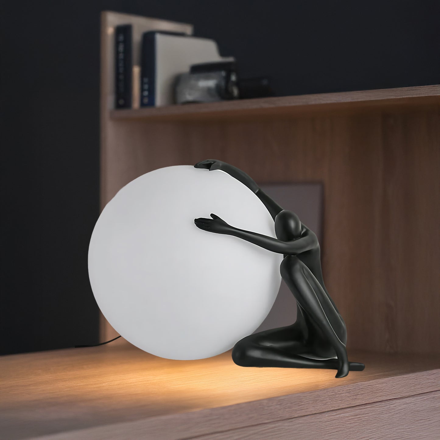 Humanoid Ball Holding Modern Material Table Lamp