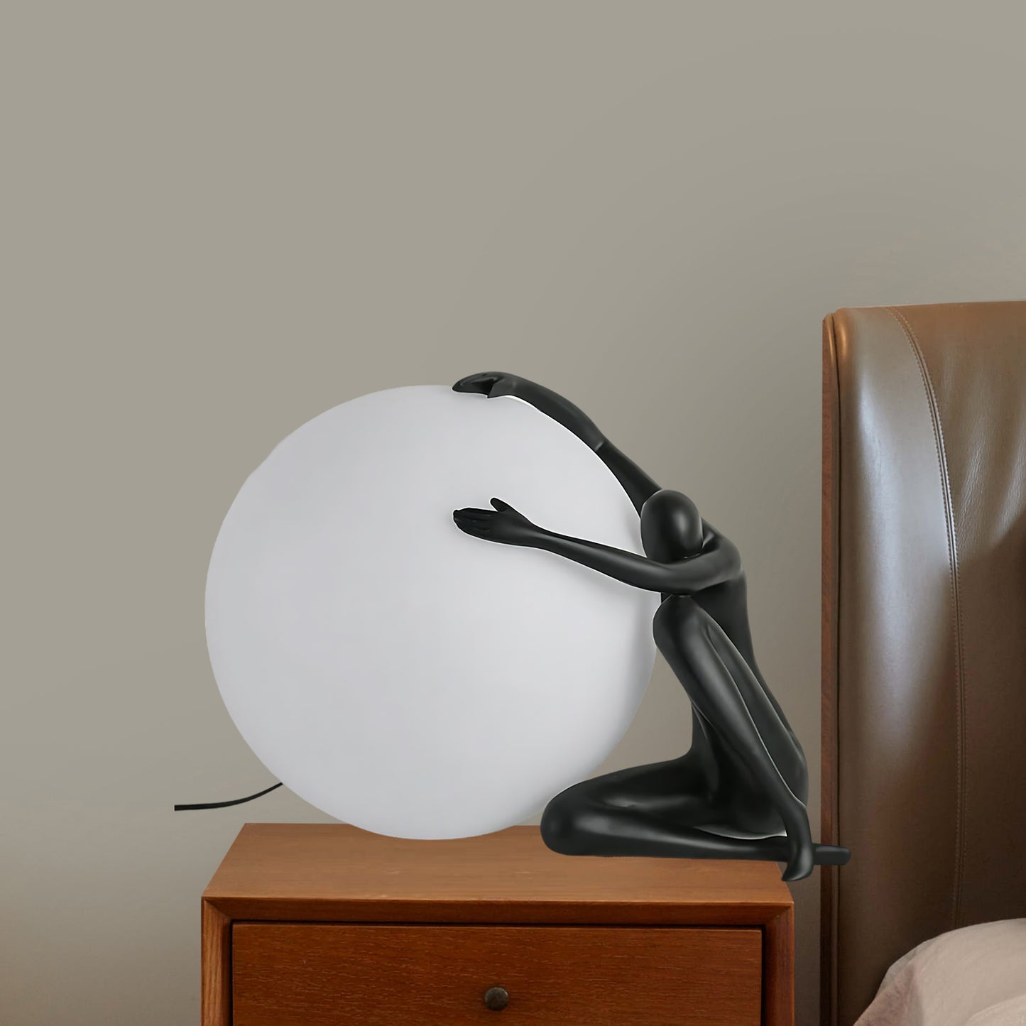 Humanoid Ball Holding Modern Material Table Lamp