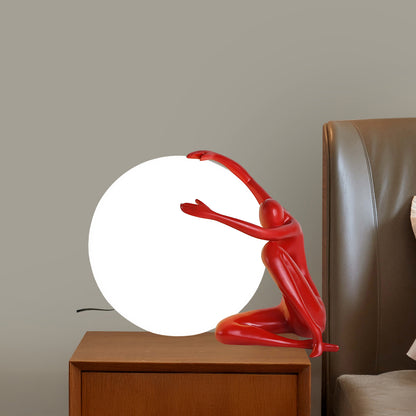 Humanoid Ball Holding Modern Material Table Lamp