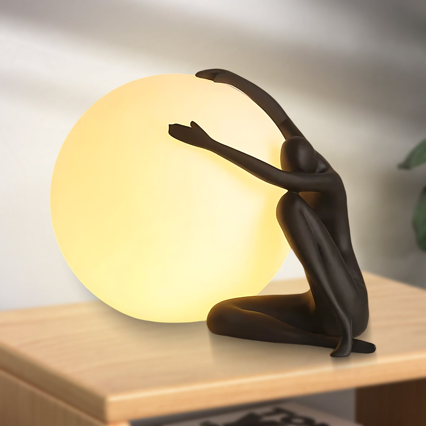 Humanoid Ball Holding Modern Material Table Lamp