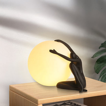 Humanoid Ball Holding Modern Material Table Lamp