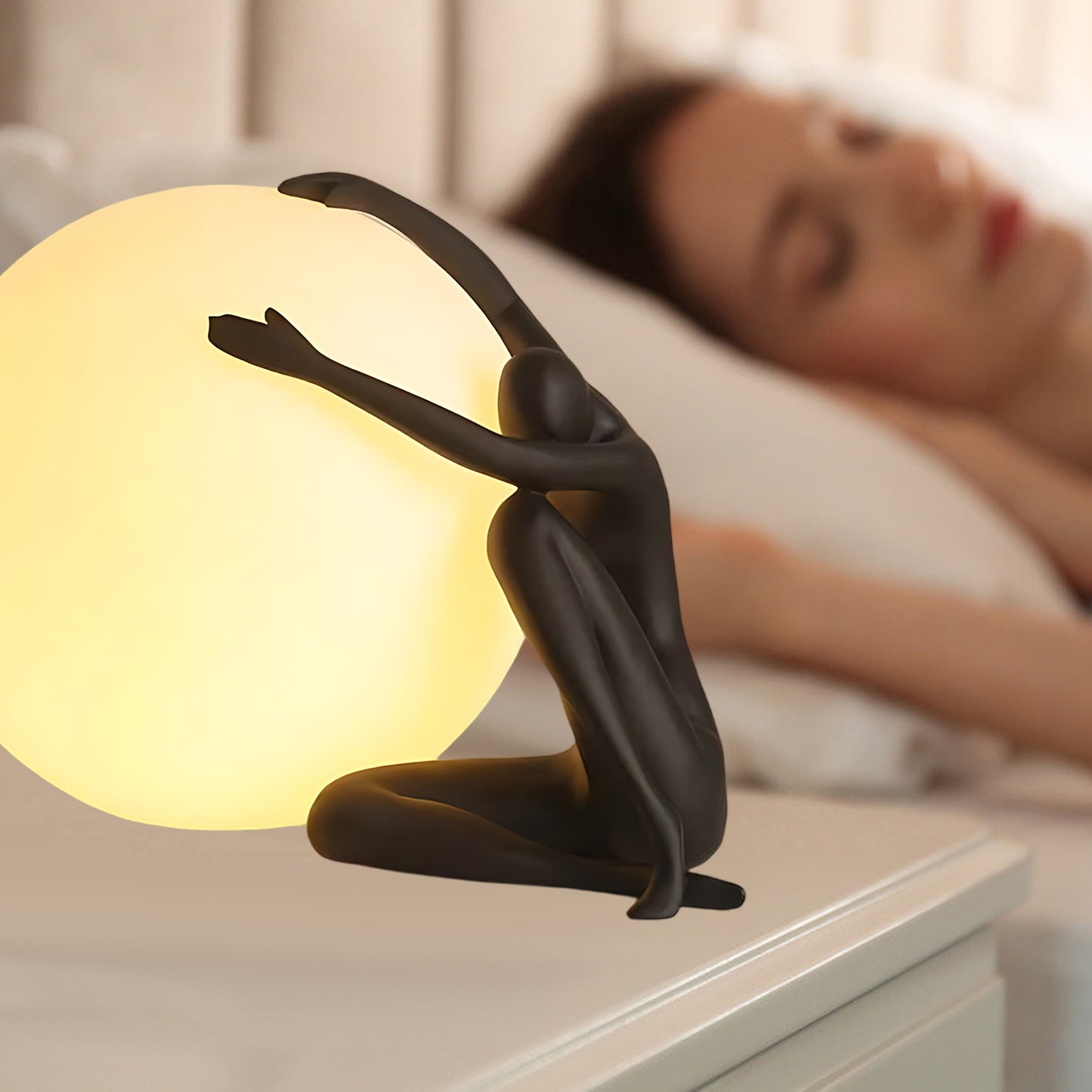 Humanoid Ball Holding Modern Material Table Lamp